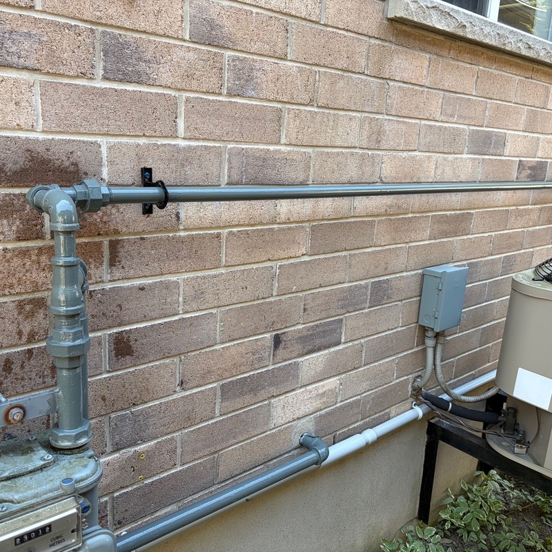 Exposed gas lines installed by Nith River Gas Services